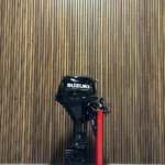2022 Suzuki 20 HP EFI Powertilt outboard engine.