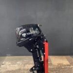 Tohatsu 15 HP EFI Powertilt outboard engine.