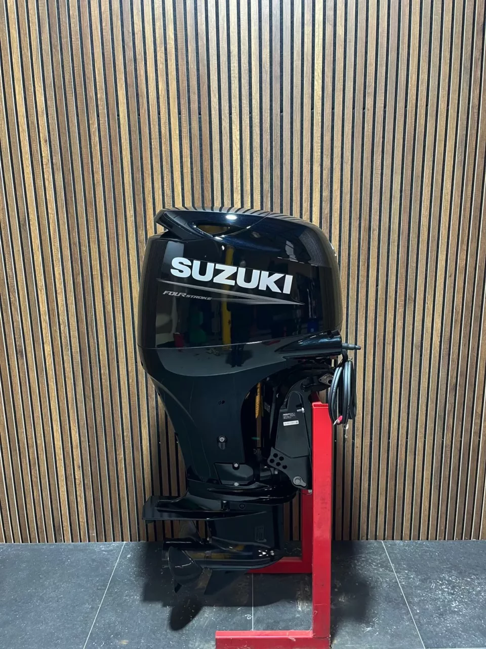 Suzuki 100 HP EFI outboard engine.