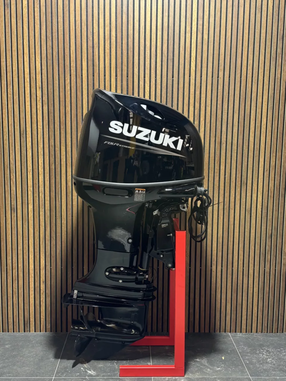 Suzuki 115 HP EFI outboard engine.