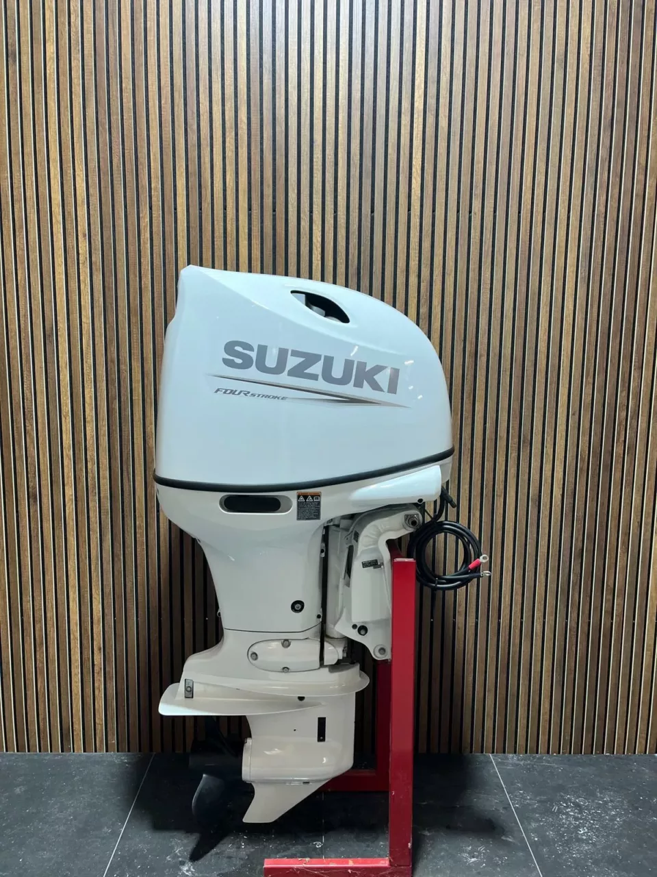 Suzuki 140 HP EFI outboard engine.