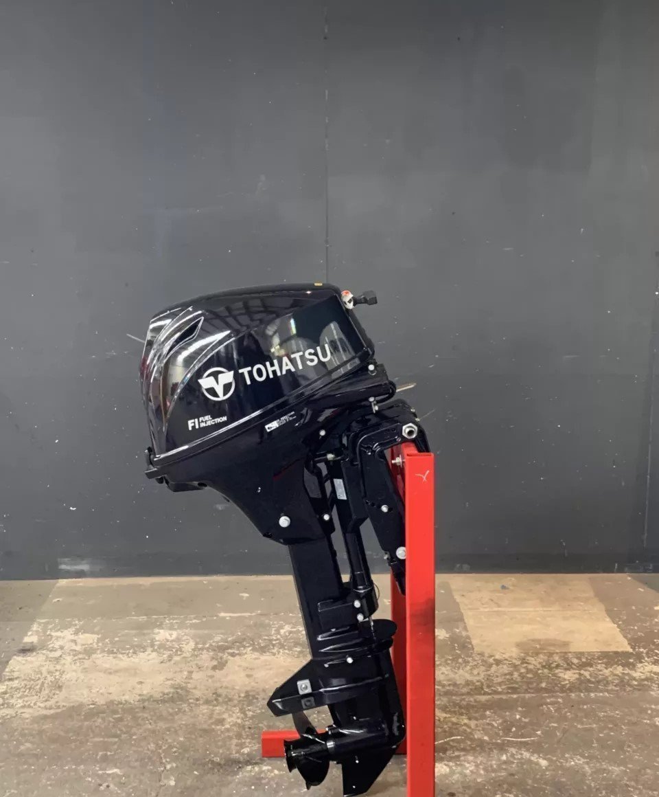 Tohatsu 15 HP EFI Powertilt outboard engine.
